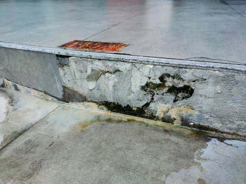 Water Damage Prevention Contractor New York - A Cement Step with Water Damage