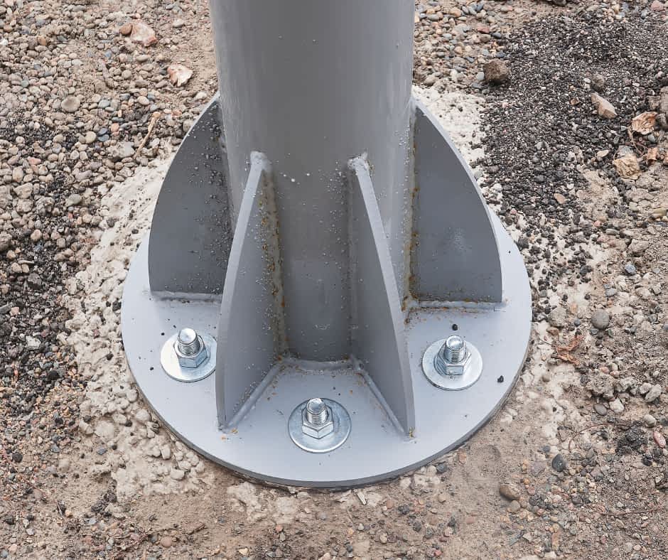 Lally Columns Contractor New York - A Closeup Picture of a New Lally Column Bolted to the Ground
